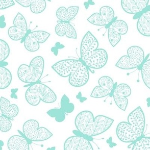 Mint green butterflies on white repeat pattern