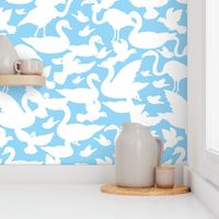 White birds silhouettes on light blue repeat pattern