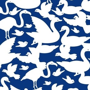 White birds silhouettes on navy blue repeat  pattern