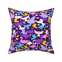 Colorful birds silhouettes on purple repeat pattern