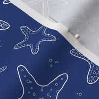 White sea stars on navy blue doodle repeat pattern