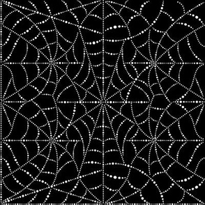 Spideweb white on black tea towel