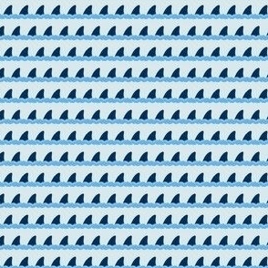 Dark blue shark with sea water on light blue background