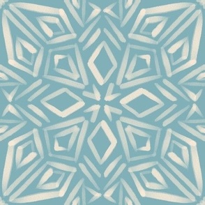 Geometric cream mandala on blue 