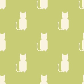 Beige cats on green