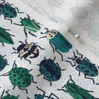 Tiny scale // These don't bug me // white background green and teal retro paper cut retro paper cut beetles and insects