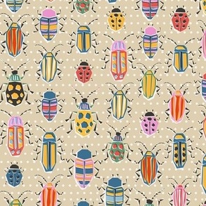 small- colourful retro bug collection/ lighter - on polka dotted sand - small scale