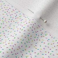 colorful sprinkles on white