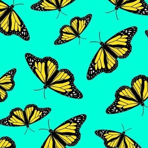  yellow butterflies on mint background