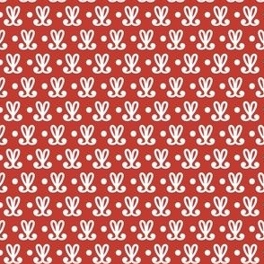 red and white pattern with white dots
