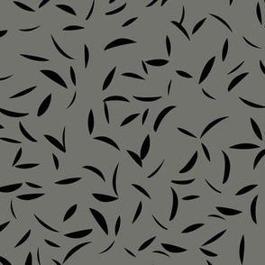 Scattered paper cut shards and moon curves abstract minimalist Scandinavian boho style nursery design neutral winter slate gray black
