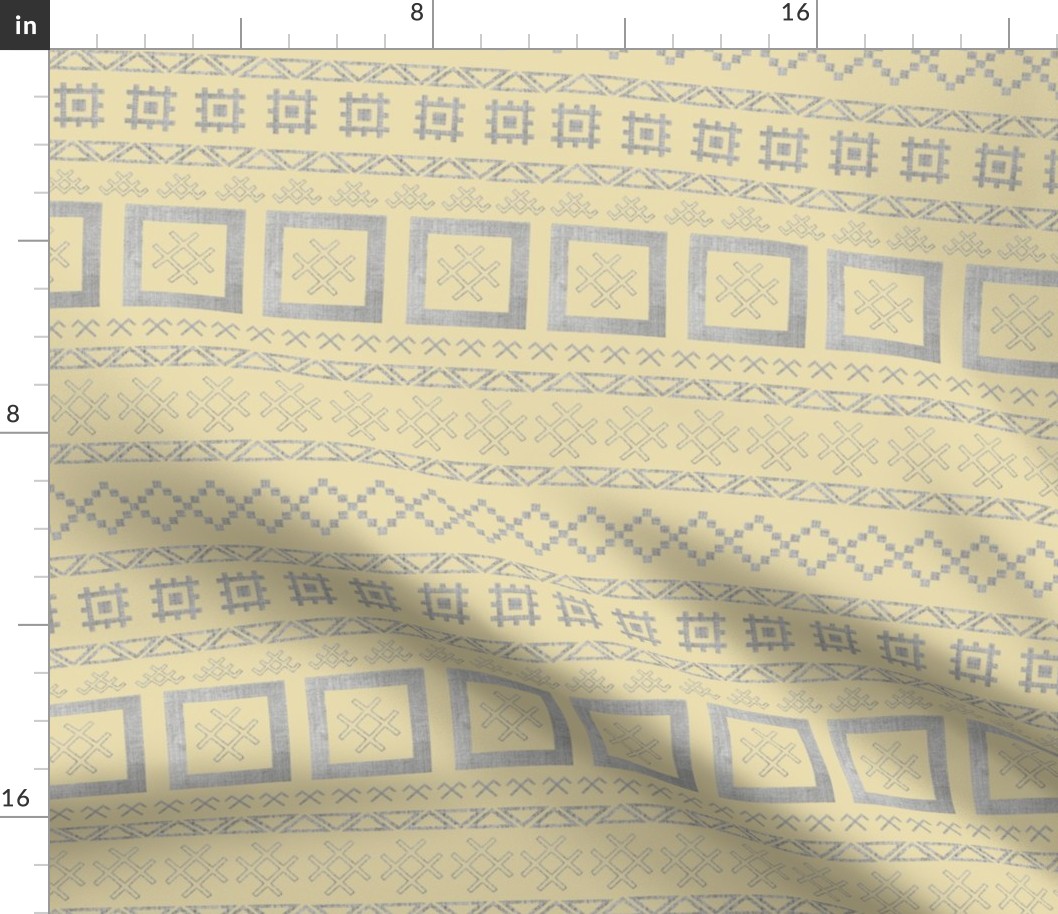 Latvian traditional symbols in rows on mellow yellow