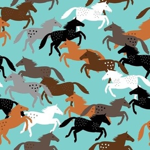 Wild Horses Running on Turquoise