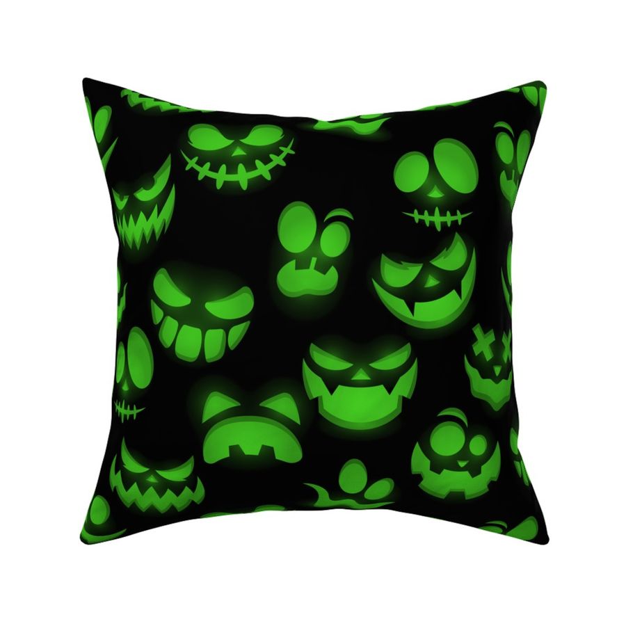 Grinning Halloween Jack o Lantern Faces in Neon Green on Black