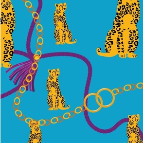 Sitting Leopards and Gold Chains in Blue Sky