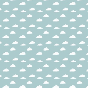 Puffy clouds on light blue 