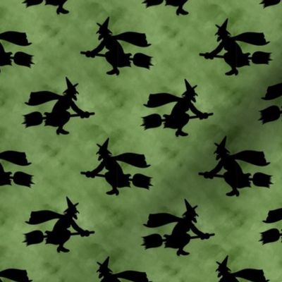 Medium Scale Wicked Flying Witches Black Silhouettes on Stormy Moss Green Sky