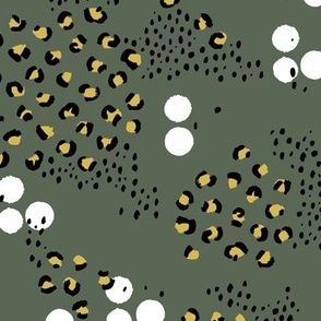 Random messy speckles spots dots and leopard print wild jungle animal in mustard yellow on camo green