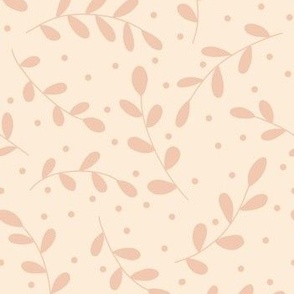 Peach branches, leaves and spots on cream