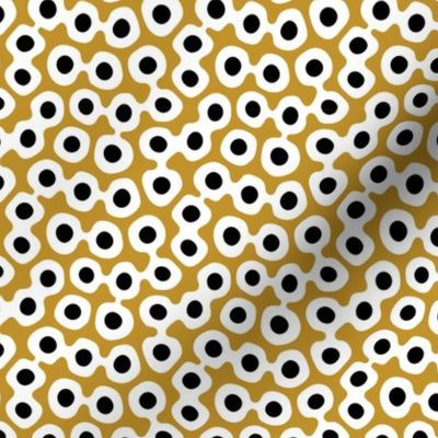 eye shapes on mustard yellow