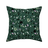 Terrazzo messy irregular spots and stains minimalist texture mint cameo green black and lilac on pine green