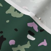 Terrazzo messy irregular spots and stains minimalist texture mint cameo green black and lilac on pine green