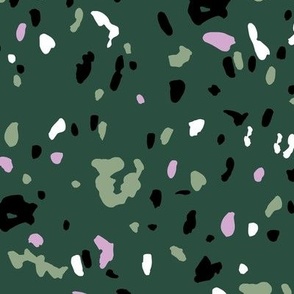 Terrazzo messy irregular spots and stains minimalist texture mint cameo green black and lilac on pine green