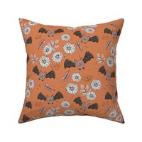 Adorable kawaii freehand bats and daisies fall lower garden boho halloween design burnt orange beige neutral pink