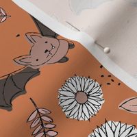 Adorable kawaii freehand bats and daisies fall lower garden boho halloween design burnt orange beige neutral pink