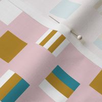 Liquorice allsorts - one-inch  squares in mustard, lagoon,  and white on cotton candy pink