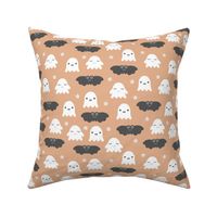 Little adorable ghosts and bats friends sweet kawaii halloween design for kids in soft orange peach gray