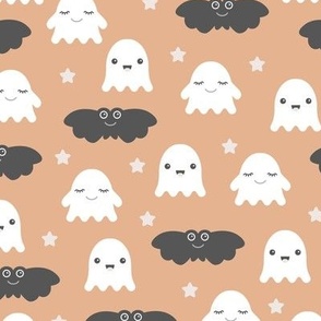Little adorable ghosts and bats friends sweet kawaii halloween design for kids in soft orange peach gray