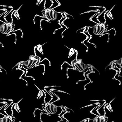 Unicorn and pegasus skeleton on black