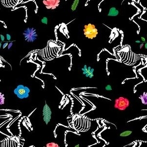 Skeletons of unicorns on a flower field