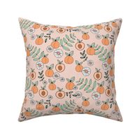 Sweet peachy fall garden leaves and peaches fruit and daisy blossom apricot orange mint green on blush