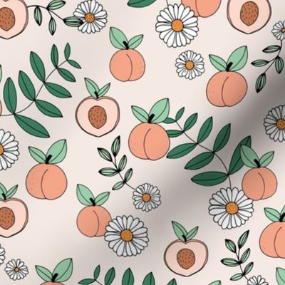 Sweet peachy fall garden leaves and peaches fruit and daisy blossom apricot orange green sage on cream sand