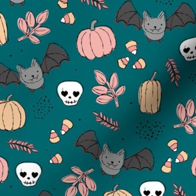 Sweet boho style halloween bats pumpkins and leaves halloween candy garden pink cream on moody blue teal night