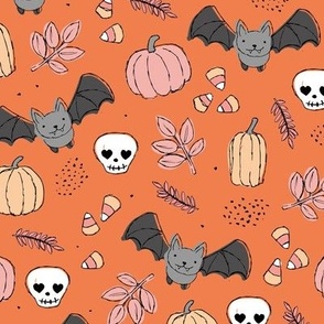Sweet boho style halloween bats pumpkins and leaves halloween candy garden pink cream on orange 