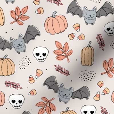 Sweet boho style halloween bats pumpkins and leaves halloween candy garden pastel cream apricot peach orange neutral