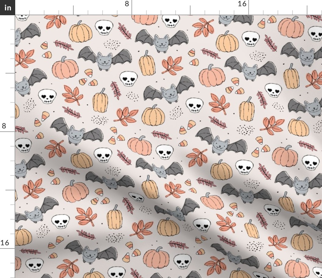 Sweet boho style halloween bats pumpkins and leaves halloween candy garden pastel cream apricot peach orange neutral