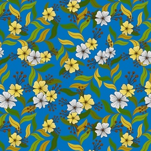 Blooming yellow and white flowers on blue background.