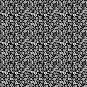 Cut out snowflakes white on black 2x2