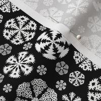 Cut out snowflakes white on black 4x4