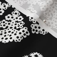 Cut out snowflakes white on black 18x18