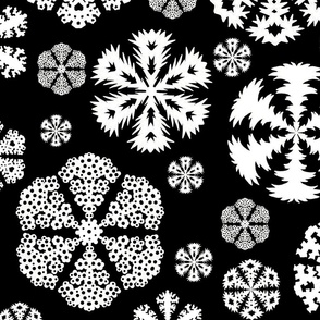 Cut out snowflakes white on black 24x24
