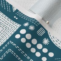 Embroidery geometrics in teal