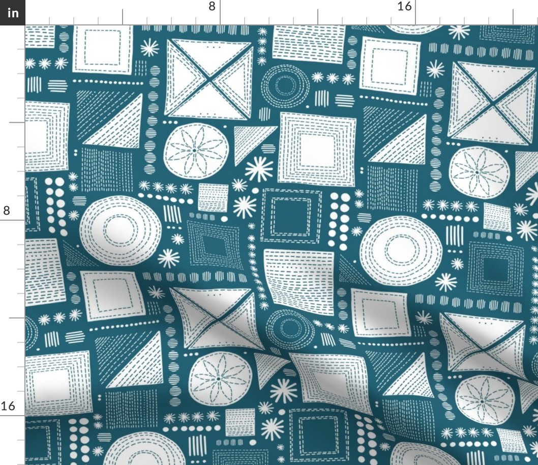 Embroidery geometrics in teal