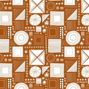 Embroidery geometrics in orange