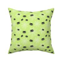 spiders and webs pastel lime green » halloween