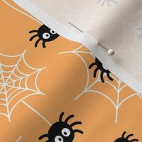 spiders and webs pastel orange » halloween